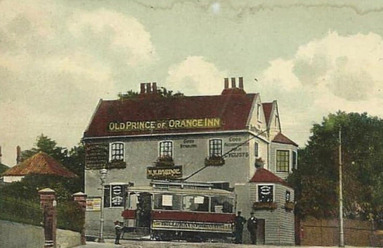 Vintage postcard of a tram outside the Old Prince of Orange Inn