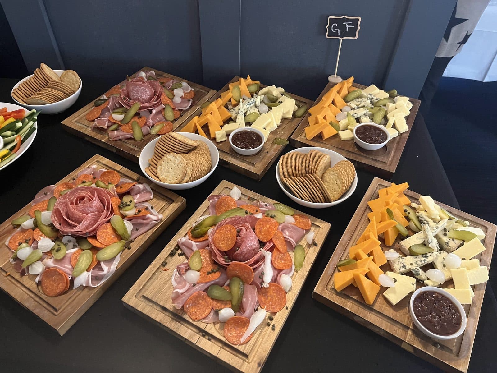 Grazing boards of cured meats, cheese and crackers