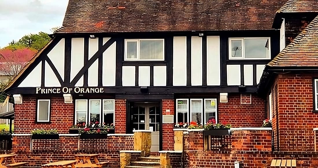 The black-and-white front of the pub