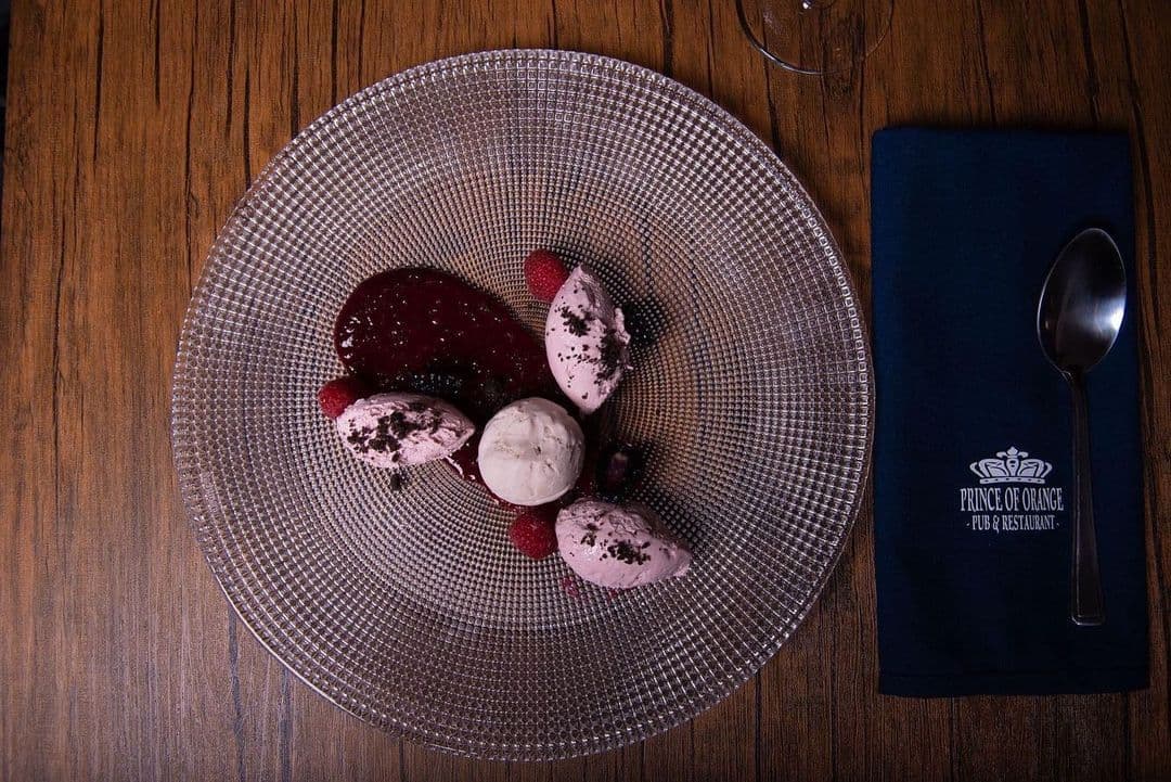 Sorbet and ice cream with berry coulis